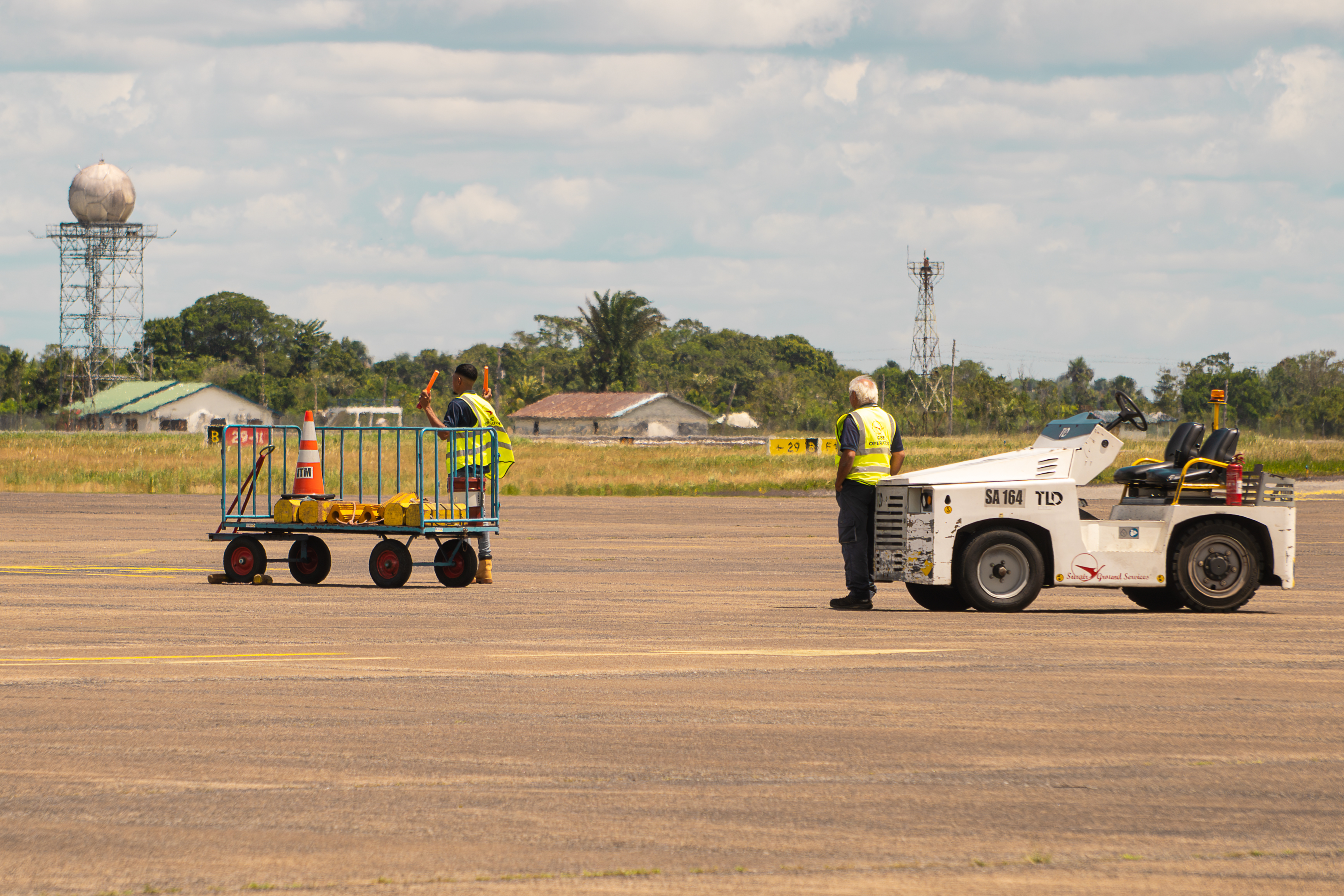 Surinam Airways ground handling team working an aircraft turnaround at Johan Adolf Pengel International Airport